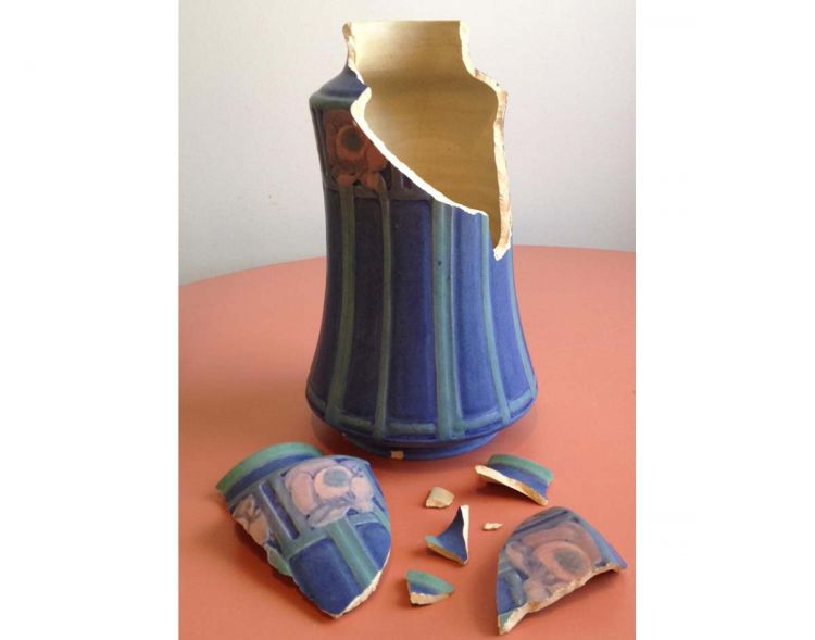 Broken Newcomb pottery